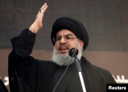 Lebanon's Hezbollah leader Sayyed Hassan Nasrallah addresses his supporters, Nov. 14, 2013.