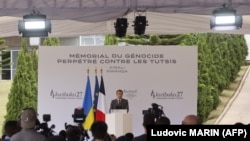 French President Emmanuel Macron delivers a speech in front of 'Kwibuka 27' or ‘remember-unite-renew’ which marks the 27th anniversary of the start of the 1994 genocide against the Tutsi in Rwanda, during visit to the Kigali Genocide Memorial