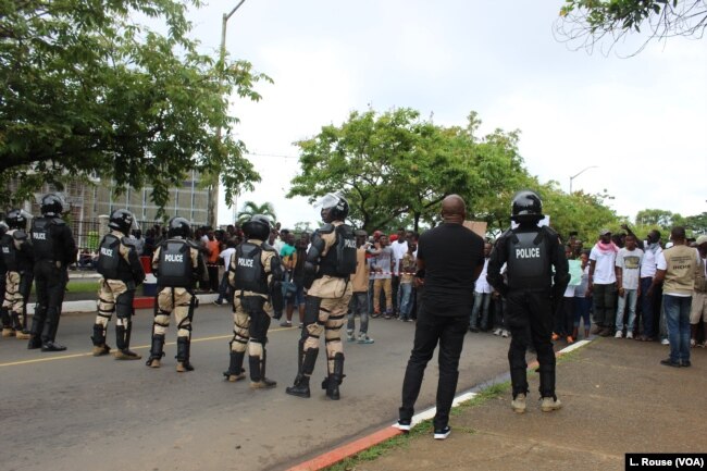 Police were present as thousands of anti-government protesters gathered in Monrovia, June 7, 2019.