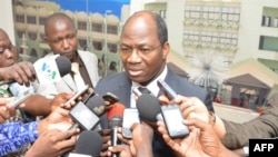 Burkina Faso's Foreign Minister Djibrill Basole speaks to media after meeting with representatives of Tuareg rebels and Malian government on June 10, 2013 at the presidential palace in Ouagadougou.