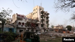 A general view shows the scene of a suicide car bombing outside Hotel Ambassador on Maka Al Mukaram Road in Somalia's capital Mogadishu, June 1, 2016. 