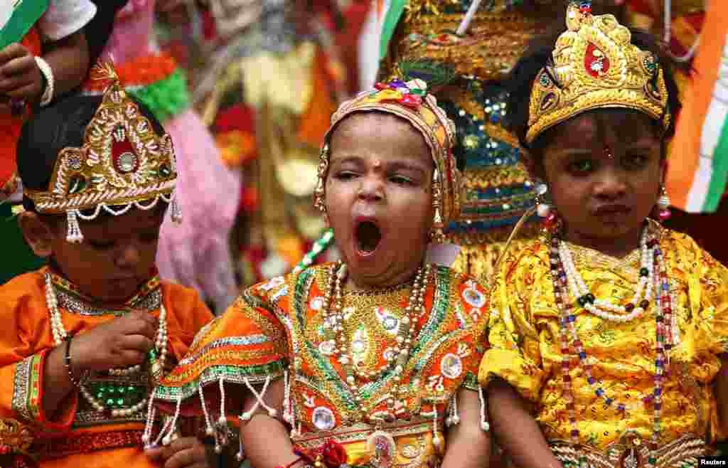 School children dressed as Hindu Lord Krishna, wait to perform during the celebrations ahead of the Janmashtami festival, which marks the birth anniversary of Lord Krishna in Ajmer, India.