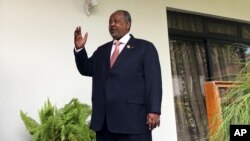 FILE - Djibouti's President Ismail Omar Guelleh arrives for a Reuters interview at his home in Ethiopia's capital Addis Ababa on January 30, 2016.