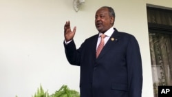 FILE - Djibouti's president, Ismail Omar Guelleh, arrives for a Reuters interview at his home in Ethiopia's capital, Addis Ababa, Jan. 30, 2016.