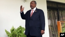 FILE - Djibouti's President Ismail Omar Guelleh arrives for a Reuters interview at his home in Ethiopia's capital Addis Ababa on Jan. 30, 2016.