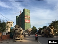 FILE - A Chinese hotel and entertainment complex under construction is seen at the Preah Sihanoukville province, Cambodia, Nov. 26, 2017.