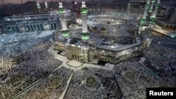 Muslim pilgrims pray around the holy Kaaba at the Grand Mosque, during the annual Hajj pilgrimage in Mecca, Saudi Arabia, Sept. 27, 2014.