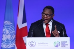 FILE - Malawi's President Lazarus Chakwera speaks at the World Leaders' Summit of the COP26 UN Climate Change Conference in Glasgow, Scotland, on November 1, 2021.