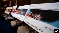 Facebook ads linked to a Russian effort to disrupt the American political process are displayed at a House Intelligence Committee hearing on Capitol Hill in Washington, Nov. 1, 2017.