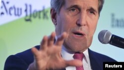 U.S. Secretary of State John Kerry speaks during the International New York Times Energy for Tomorrow Conference at the Hotel Potocki, the Chamber of Commerce and Industry on the sidelines of the COP21 UN conference on climate change in Paris, Dec. 9, 2015.
