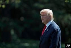 President Donald Trump walks to Marine One on the South Lawn of the White House, Aug. 4, 2017, in Washington. Trump is spending a working vacation in Bedminster, New Jersey.