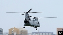 US Marines' CH-46E helicopter takes off from the US Marine Corps Air Station Futenma in Ginowan, Okinawa prefecture. (File 2010)