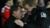 Liverpool manager Brendan Rodgers, left, and Bournemouth manager Eddie Howe speak ahead of the English League Cup soccer quarterfinal match between AFC Bournemouth and Liverpool at Goldsands Stadium, Bournemouth, Wednesday, Dec. 17, 2014. (AP Photo/Tim Ir