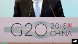 FILE - An official speaks at a G-20 meeting in Beijing, Jan. 14, 2016. The 2016 G-20 summit will open in Hangzhou in eastern China's Zhejiang province Sept 4.