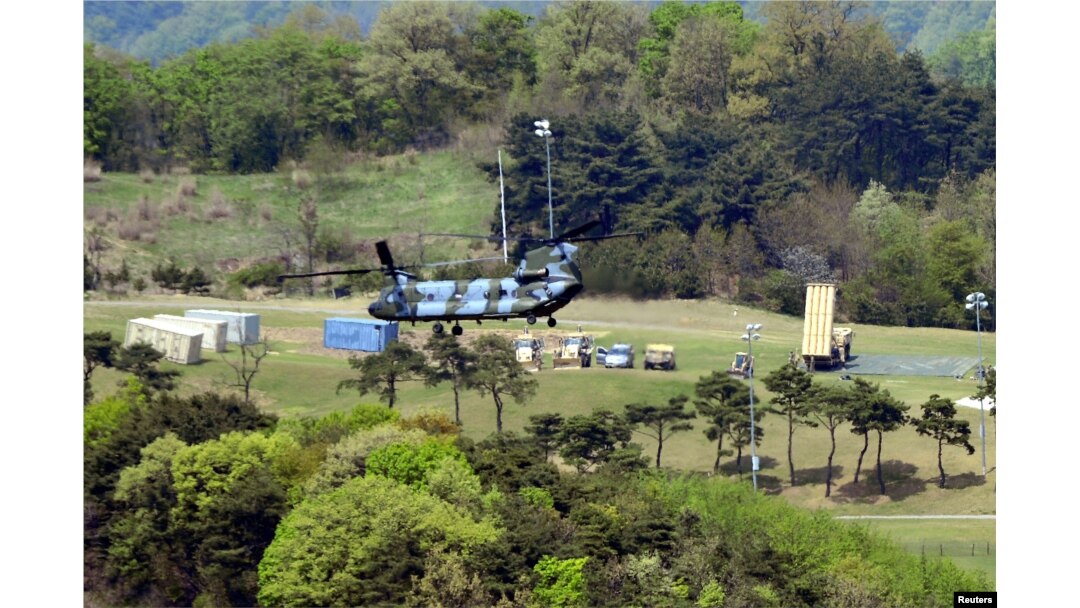 FILE - A Terminal High Altitude Area Defense (THAAD) interceptor (right) is seen in Seongju, South Korea, April 26, 2017.