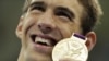 Phelps suma medalla número 20