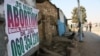 In South African townships, there are plenty of advertisements offering illegal abortions, but little education about HIV. (D. Taylor/VOA)