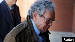 FILE - John Kapoor, the billionaire founder of Insys Therapeutics Inc, arrives at the federal courthouse for the first day of the trial accusing Insys executives of a wide-ranging scheme to bribe doctors to prescribe an addictive opioid medication, in Boston, Jan. 28, 2019.