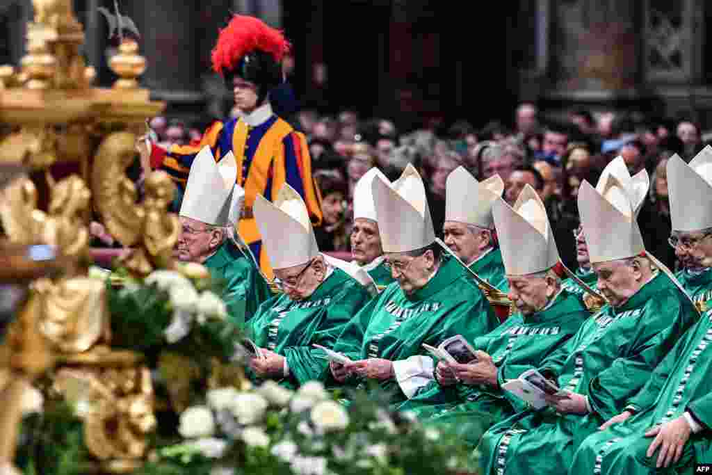 Prelates attend a Pope&#39;s Mass to mark the newly established &quot;Sunday of the Word of God&quot; at St. Peter&#39;s Basilica in the Vatican, Jan. 26, 2020.