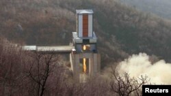 A new engine for an intercontinental ballistic missile (ICBM) is tested at a site at Sohae Space Center in Cholsan County, North Pyongan province in North Korea.