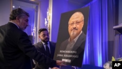 FILE - An image of slain Saudi journalist Jamal Khashoggi is set up before an event at which the Washington Post columnist was remembered, in Washington, Nov. 2, 2018.