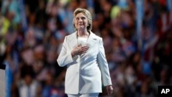 Democratic presidential nominee Hillary Clinton takes the stage to give her acceptance speech during the final day of the Democratic National Convention in Philadelphia , Thursday, July 28, 2016. (AP Photo/Paul Sancya)