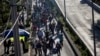 Migrant Caravan Continues Trek Toward US Border Despite Trump's Suspension of Asylum Rights