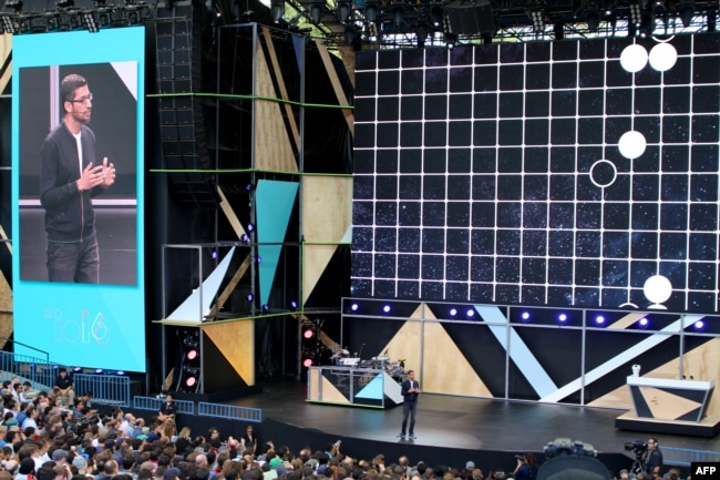 FILE - Google chief executive Sundar Pichai outlines a future rich with artificial intelligence at the Internet firm's annual developers gathering in the Silicon Valley city of Mountain View, Calif., May 18, 2016.