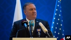 U.S. Secretary of State Mike Pompeo, holds a joint press conference with Qatari Foreign Minister Sheikh Mohammed bin Abdulrahman al-Thani, at the Sheraton Grand in Doha, Qatar, Jan. 13, 2019. 