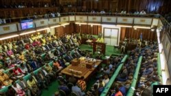 FILE - Uganda's President Yoweri Museveni gives a state of security address during a special session of the Parliament in kampala on June 20, 2018.