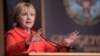 Former Secretary of State Hillary Clinton speaks at Georgetown University in Washington, March 31, 2017, on the important role that women can play in international politics and peace building efforts.