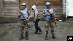 FILE - Two MONUSCO soldiers are seen standing guard in Goma, DRC.