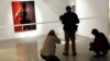 The controversial portrait of South African President Jacob Zuma painted by Brett Murray stands defaced at the Goodman Gallery in Johannesburg, South Africa.
