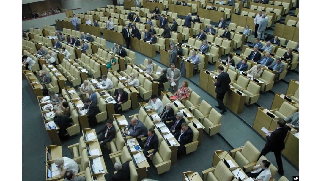 FILE - Russian lawmakers attend a session of the lower house of the State Duma in Moscow, Russia, July 6, 2012.