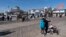 People enjoy the boardwalk, Friday, Nov. 13, 2020, in Rehoboth Beach, Del. This resort town known for Atlantic waves that are sometimes surfable, fresh-cut French fries and a 1-mile wooden boardwalk that dates back to the 1870s. (AP Photo/Alex Brandon)