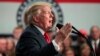 FILE - President Donald Trump speaks about tax reform at the St. Charles Convention Center in St. Charles, Missouri, Nov. 29, 2017.