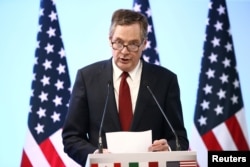 FILE - U.S. Trade Representative Robert Lighthizer speaks during a news conference in Mexico City, Mexico, March 5, 2018.
