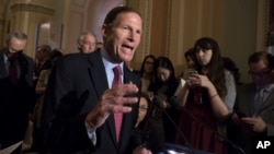 Sen. Richard Blumenthal, D-Conn., and other Democrats respond to questions from reporters, May 16, 2017, on Capitol Hill.