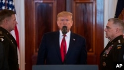 El presidente de Estados Unidos, Donald Trump, se dirige a la nación en un discurso televisado para anunciar nuevas sanciones contra Irán, el 8 de enero de 2020.