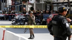 Un policier tué dans un double attentat suicide devant l'ambassade américaine à Tunis