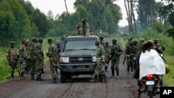 Des combattants de l'ex-mouvement rebelle M23 près de Kibumba, au nord de Goma, Nord-Kivu, 27 novembre 2012.