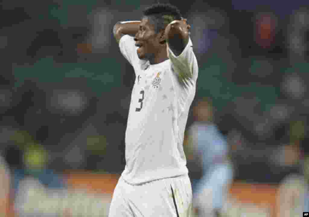 Ghana's Asamoah Gyan reacts during their African Cup of Nations Group D soccer match against Botswana in FranceVille Stadium January 24, 2012.
