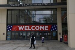 A person walks outside the Charlotte Convention Center, the site of the Republican National Convention, in Charlotte, North Carolina, U.S., August 22, 2020. REUTERS/Leah Millis