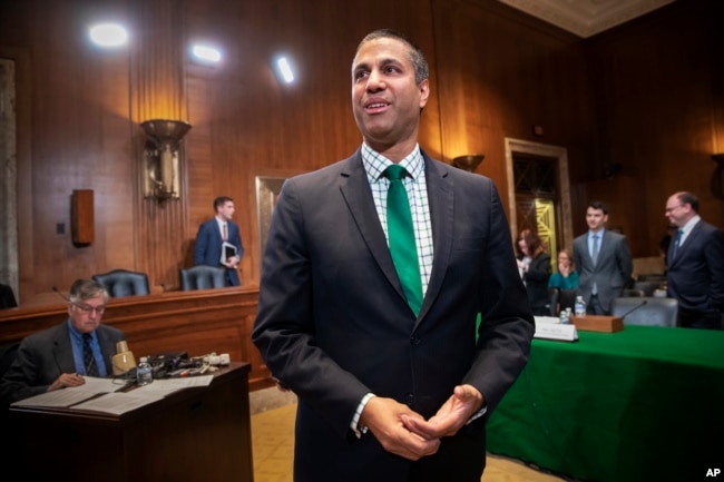 FCC Chairman Ajit Pai prepares to testify about his budget before a Senate Appropriations subcommittee on Capitol Hill in Washington, May 17, 2018.