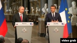 Macron Accuses Russian State Media Of 'Propaganda' video grab