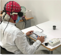 In this photo, a blind patient is seen taking part in experiments carried out by American and European researchers in the field of optogenetics. During the experiments, a 58-year-old blind man was able to use special eyeglasses to identify and count diffe