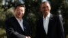 美國總統奧巴馬(右)去年7月在加州與中國國家主席習近平會面。