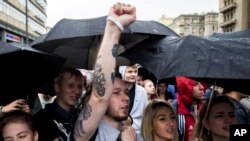 People shout during an opposition rally demanding free internet in Moscow, Russia, Aug. 26, 2017. About 1,000 people attended the protest against the government's internet policy. 
