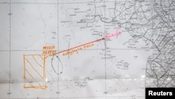 Ðường bay trên một bản đồ trong một cuộc họp báo về các hoạt động tìm kiếm cứu nạn chuyến bay Malaysia bị mất tích. 