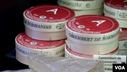 French cheese makers are fighting to preserve AOP labels, like this one for camembert. (L. Bryant/VOA)